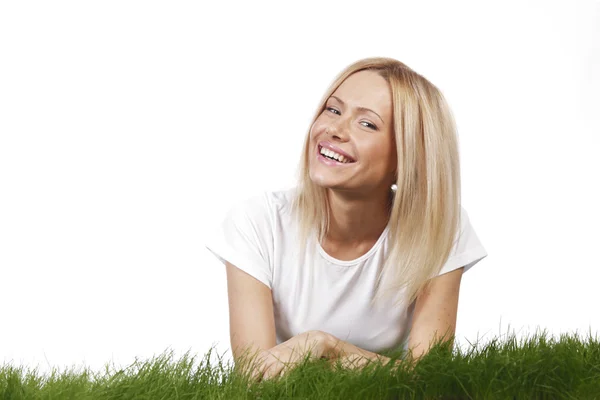 Smiling woman on grass — Stock Photo, Image