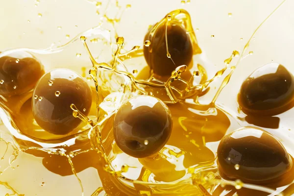 Брызги оливкового масла — стоковое фото