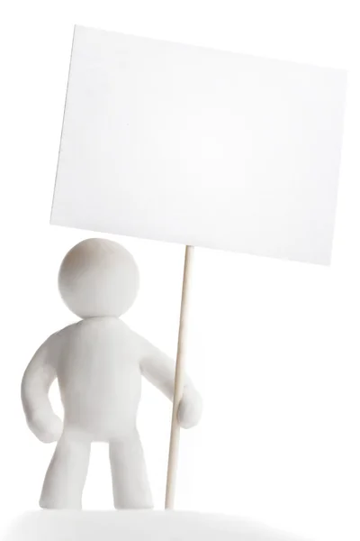 Knetgummi-Mann mit Schild — Stockfoto