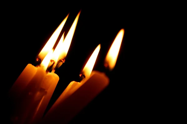 Queimando velas em preto — Fotografia de Stock