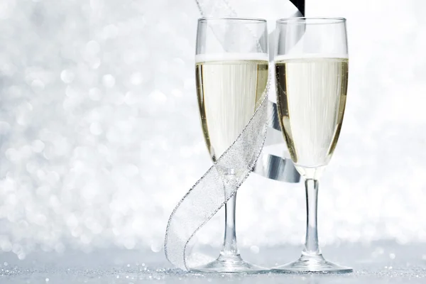 Champagne and bow — Stock Photo, Image