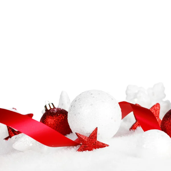 Christmas decorations in snow — Stock Photo, Image