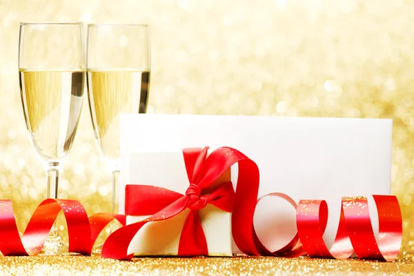 Champagne and present Stock Image