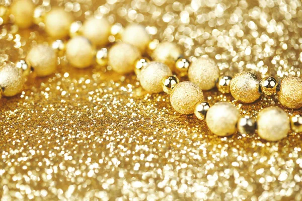 Golden decorative beads — Stock Photo, Image