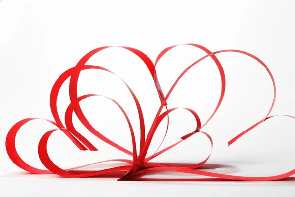 Paper ribbon hearts on white background, Valentines day concept — Stock Photo, Image