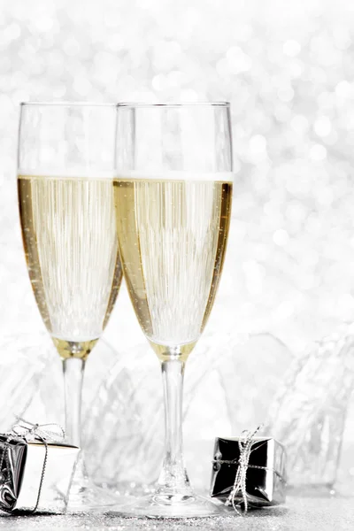 Champagne and gifts — Stock Photo, Image