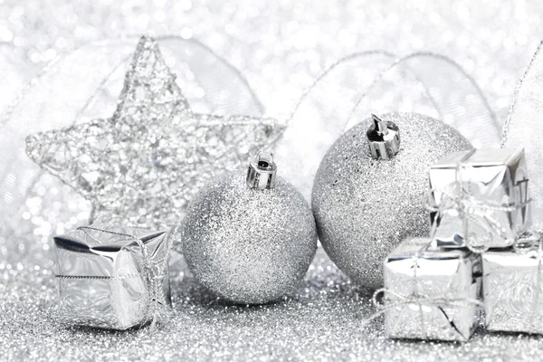 Christmas decoration on silver glitter background — Stock Photo, Image