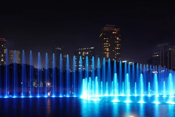 Fountain at night in — Stock Photo, Image