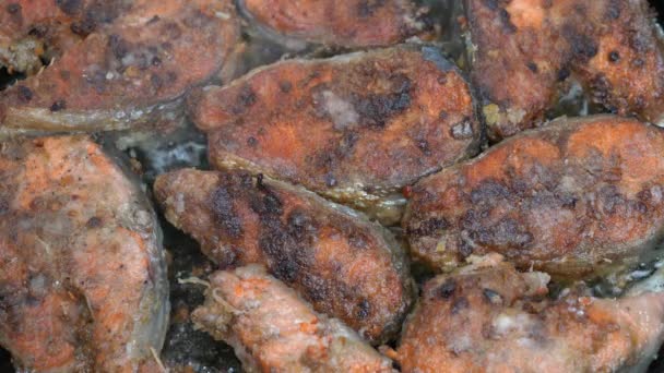 Close up view of cooking Sockeye Salmon fish in flour frying in iron pan with oil. Grilled Pacific red Salmon - popular Asian dish — Stock Footage Close up view of cooking Sockeye Salmon fish in flour frying in iron pan with oil. Grilled Pacific red Salmon - popular Asian dish Video Clip