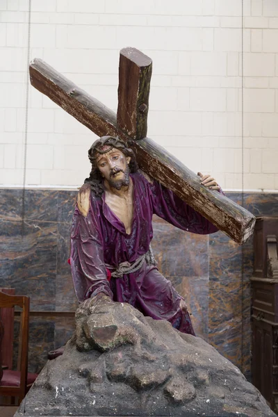 Statue of Jesus Christ holing a cross — Stock Photo, Image