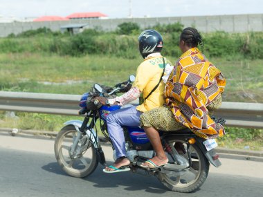 Motorcycle taxi in Benin clipart