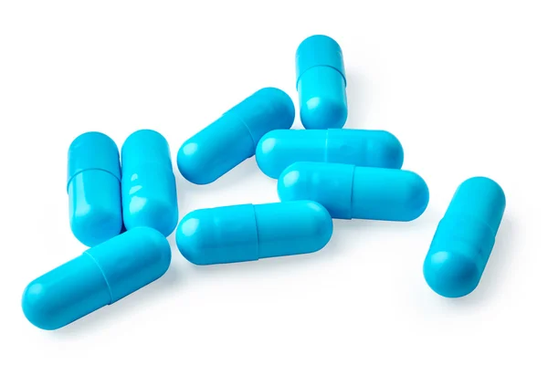 Pílulas azuis isoladas em branco — Fotografia de Stock