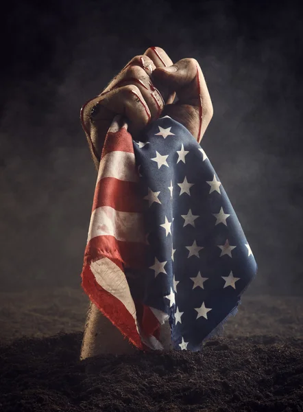 Bandera americana en mano humana — Foto de Stock