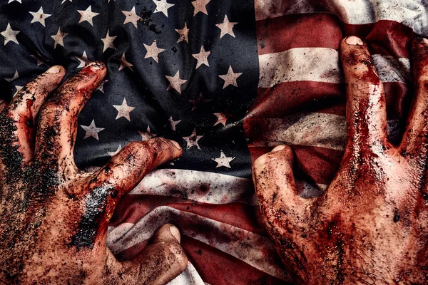 Hands of soldier protect american flag — Stock Photo, Image