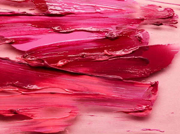 Textur Läppstift Olika Färger Över Rosa Bakgrund — Stockfoto