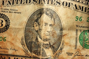 Grunge 'un arka planında Amerikan Başkanı Lincoln' ün portresi var.