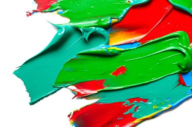 Abstract texture of few different strokes of paint on white