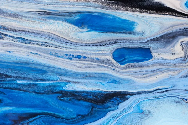 青い流れるような絵具の質感の写真 背景のための創造的なデザイン 北極空撮コンセプトショット — ストック写真