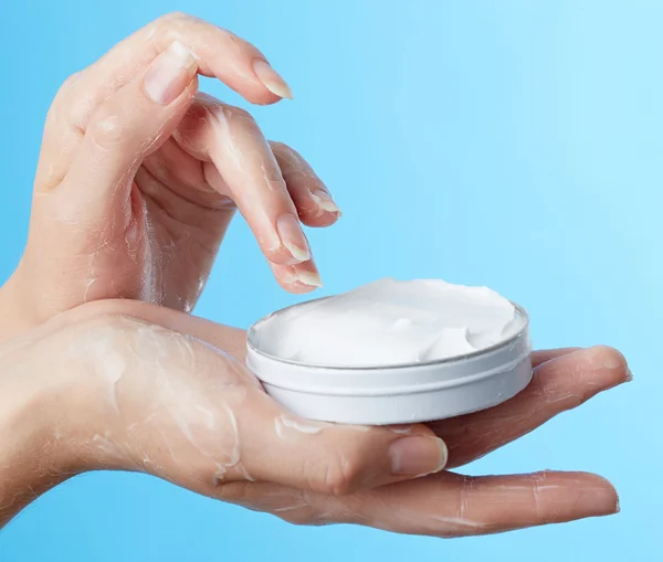 Woman's hands with moisturizer cream — Stock Photo, Image