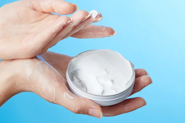 Woman's hands with moisturizer cream — Stock Photo, Image