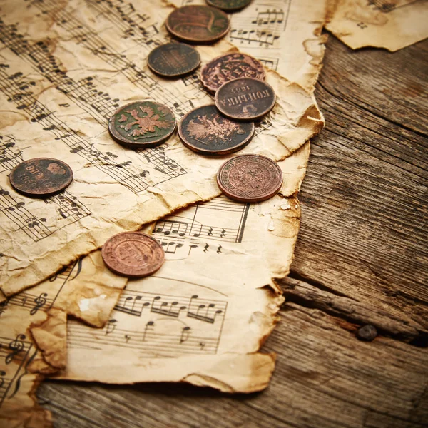 Bodegón vintage con monedas antiguas — Foto de Stock