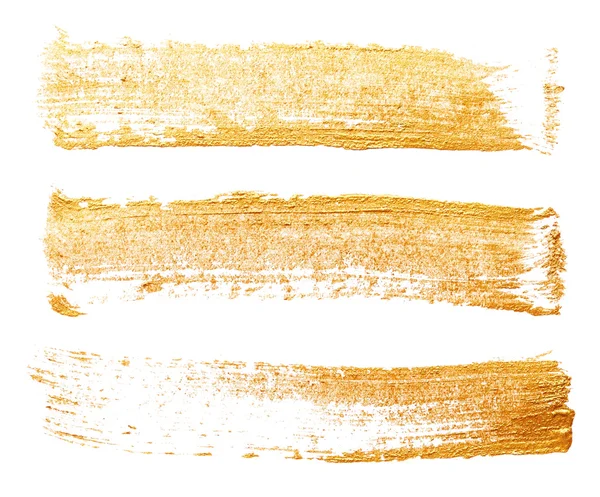 Strokes of golden paint — Stock Photo, Image