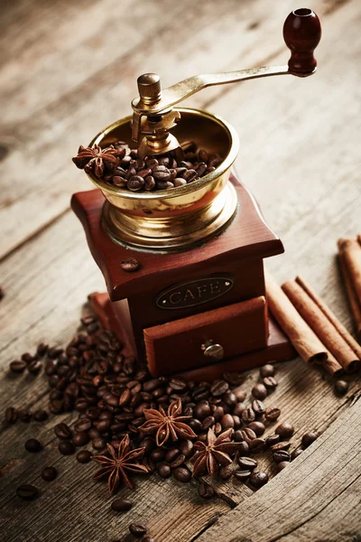 Coffee grinder with coffee beans — Stock Photo, Image