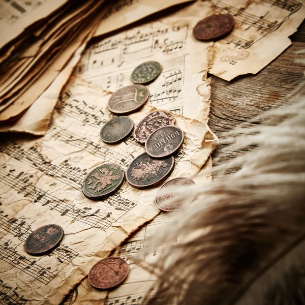 Bodegón vintage con monedas antiguas — Foto de Stock