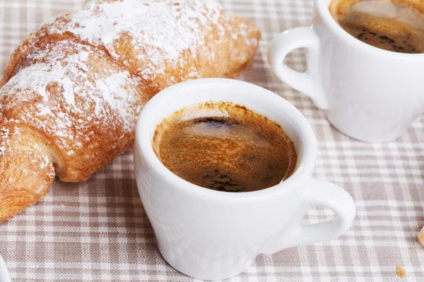 Cups of coffee with croissant — Stock Photo, Image