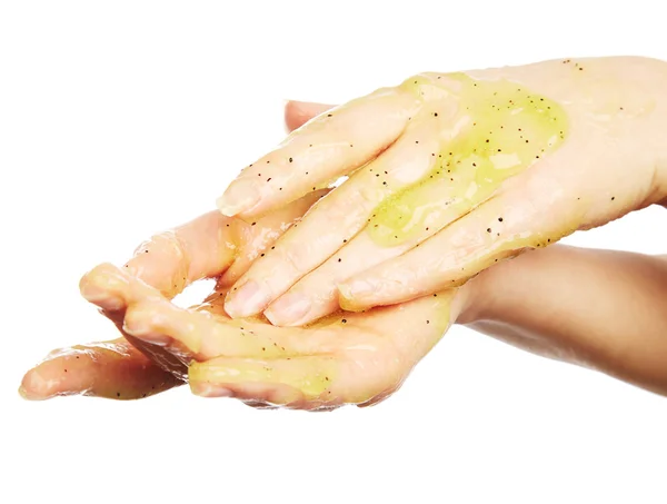 Manos femeninas en el exfoliante corporal — Foto de Stock