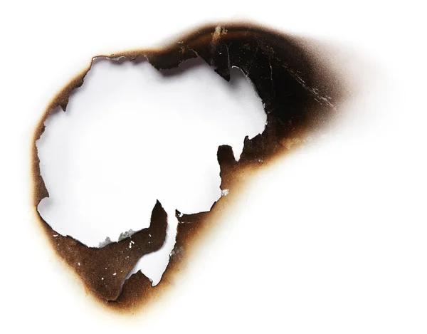 Burnt hole of paper — Stock Photo, Image