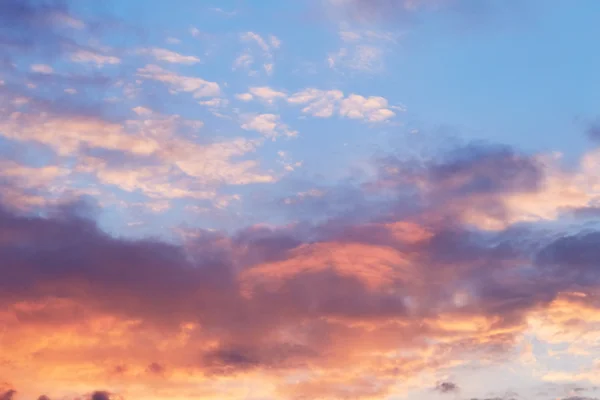 Sunset with bright clouds — Stock Photo, Image