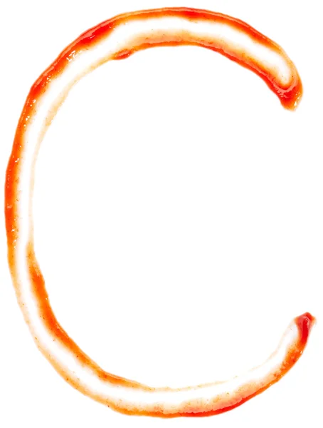 Буква С сделана кетчупом — стоковое фото