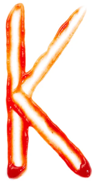Carta K feita por ketchup — Fotografia de Stock