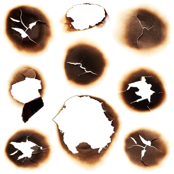 Set of burnt holes — Stock Photo, Image