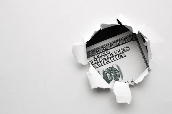 Hundred dollars in hole of paper — Stock Photo, Image
