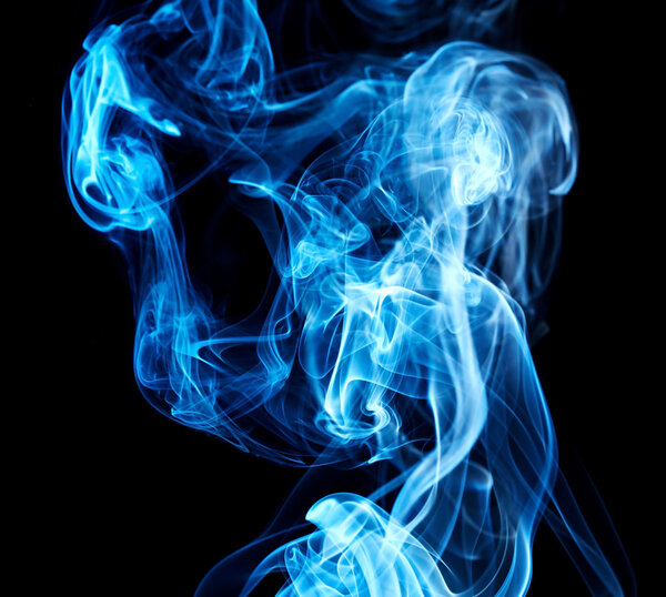 Bright abstract smoke swirls on black background