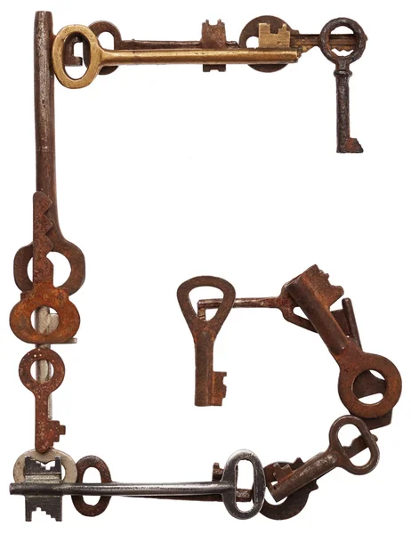 Алфавіт зі старих ключів. Літера G — стокове фото