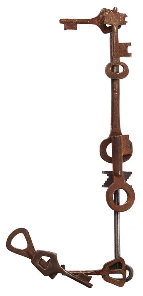 Алфавит из старых ключей. Буква J — стоковое фото