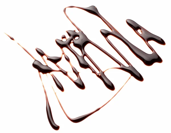 Liquid chocolate  on white background — Stock Photo, Image
