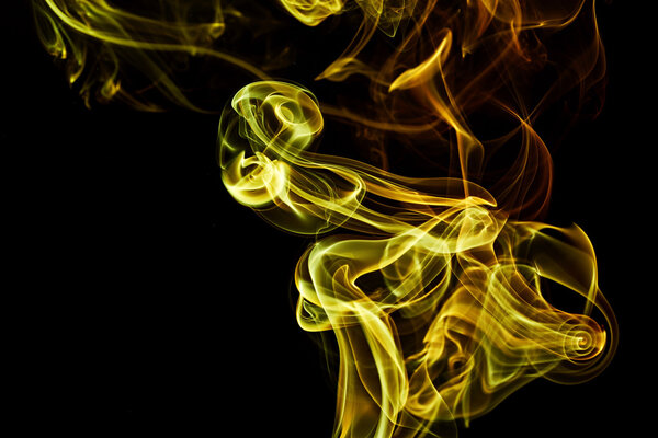 Bright abstract smoke swirls on black background