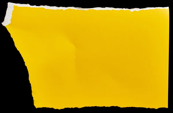 Жовтий картон на чорному тлі — стокове фото