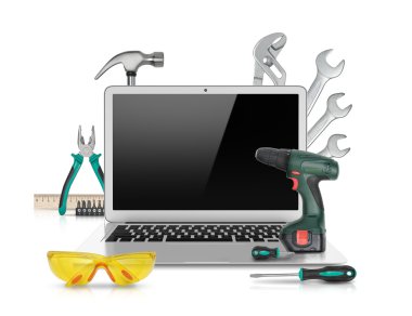 Open laptop with tools isolated on white background. Symbol of repair, upgrade and improvement