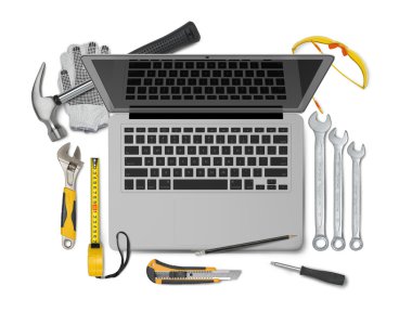 Open laptop with tools isolated on white background. Symbol of repair, upgrade and improvement