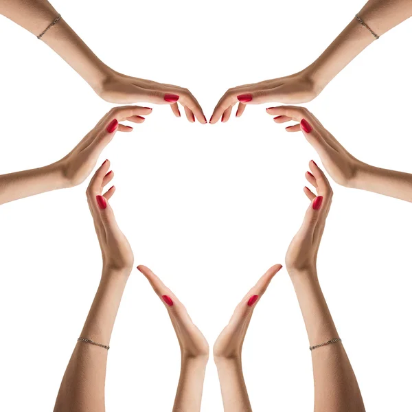 Sign of heart from hands folded isolated on white background. Family, love concept — Stockfoto