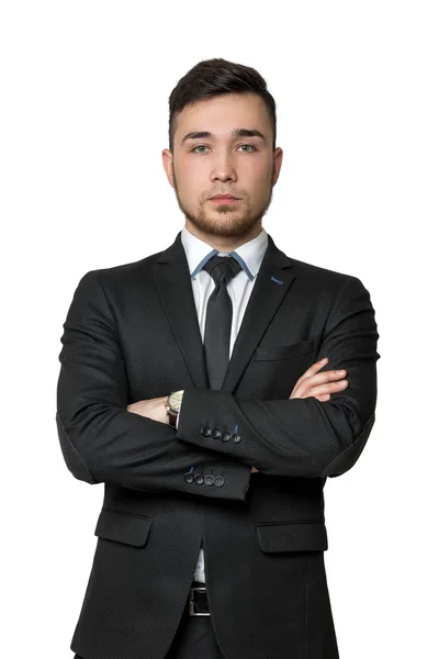 Young business man, arms crossed his chest, isolated on a white background — Stok fotoğraf