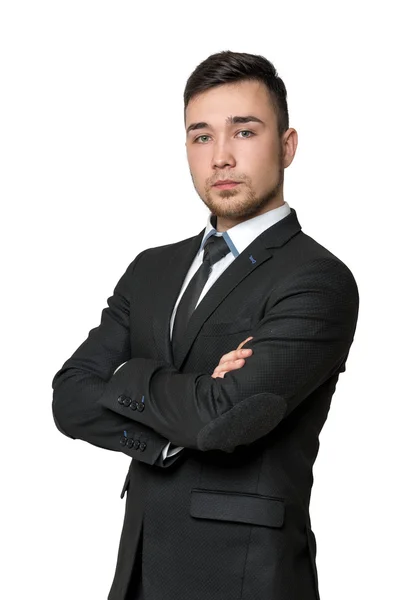 Young business man, arms crossed his chest, isolated on a white background — Stok fotoğraf