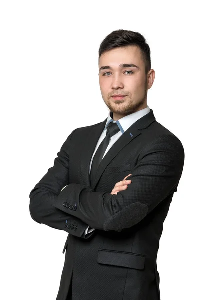 Smile young man in business suit, arms crossed his chest, isolated on a white background — Zdjęcie stockowe