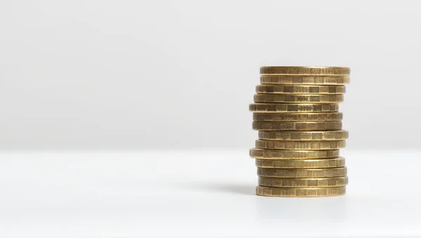 Pile of coins with open space at center and left side, isolated on white background. Russian rouble — Stockfoto