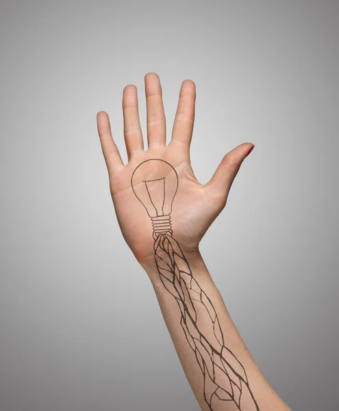 Hand with an open palm, tattoos bulbs and veins on grey background. Ecological, social, technology concept — Φωτογραφία Αρχείου